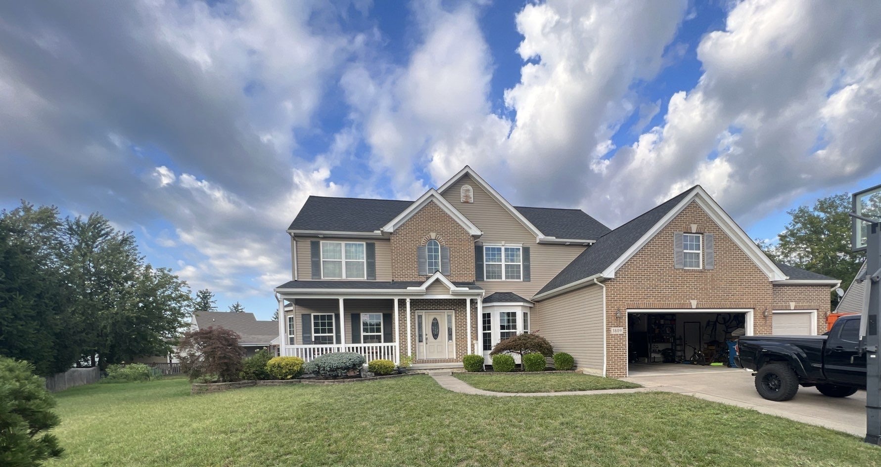 Bold New Look for This Avon Home - Avon roofing project