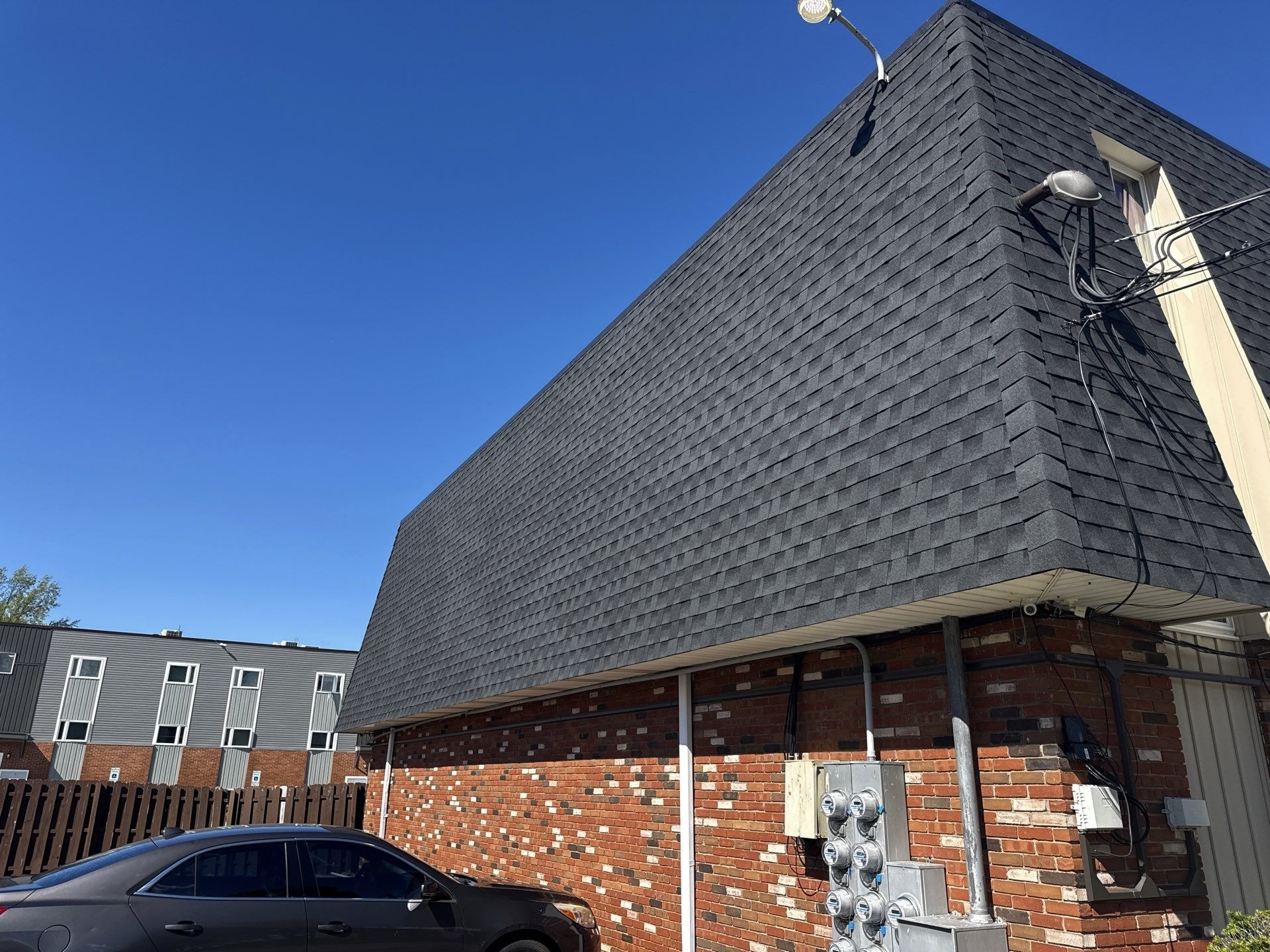 Apartment Building Mansard Roof Replacement in Lorain, OH - additional view
