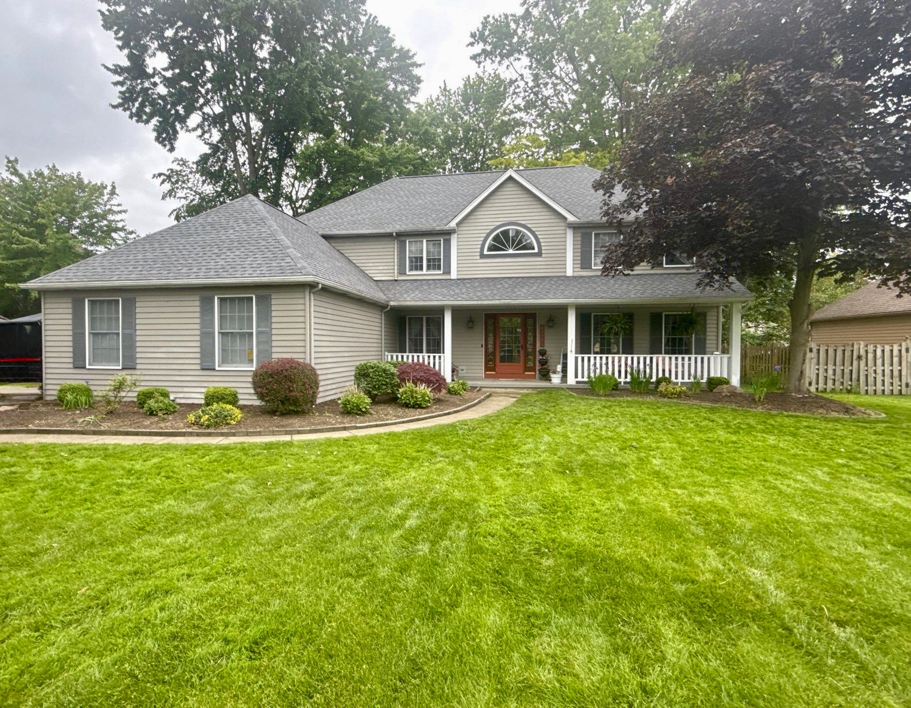 Storm Damaged Roof Replacement on Traditional Colonial Home - Westlake roofing project